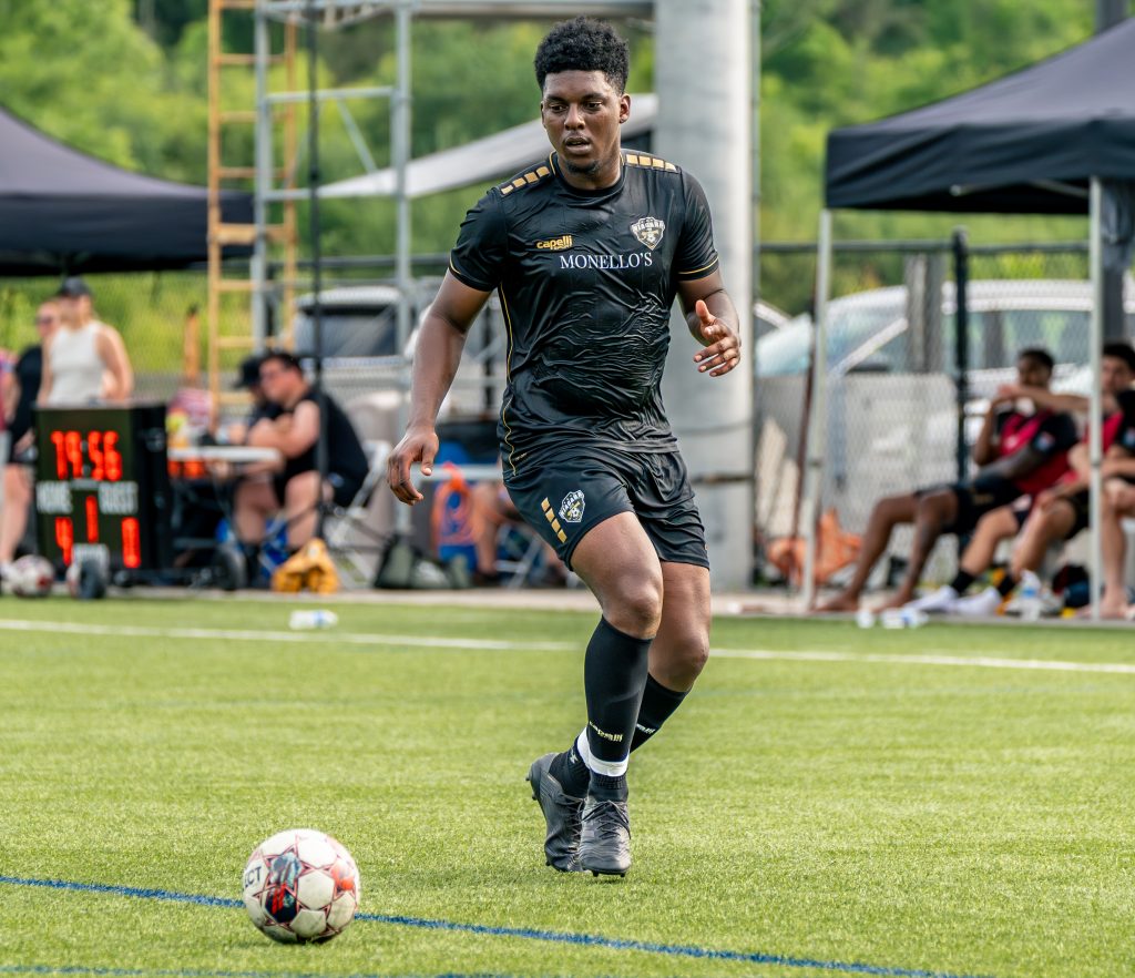 Tyler Montaque playing soccer