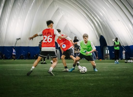Youth players competing at the InTouch Football Pro Football Combine in Toronto