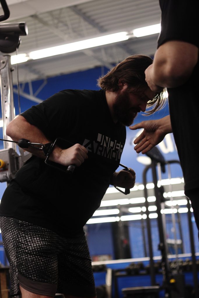 Hyrox athlete rowing