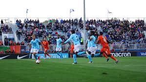 Christopher Kalongo signing for TFC II after winning CPL titles with Forge FC.